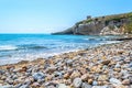 Rocks and sand by the sea in Santa Caterina di Pittinuri beach Royalty Free Stock Photo
