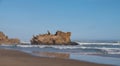 Rocks on the sandy beach at Brenton on Sea, Knysna, photographed at sundown, South Africa. Royalty Free Stock Photo