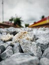 Rocks scattered on the railroad as vibration dampers. taken in the afternoon in an area called Padang, Indonesia