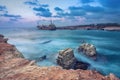 Rocks in sea with abandoned ship, Paphos, Cyprus Royalty Free Stock Photo