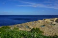 Rocks at the sea, beautiful walking path at the salt pans