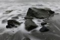 Rocks and smooth water