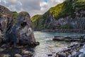 Rocks, stone and cliff mount in lowlight evening with ocean water in Port of Santa Iria, SÃ£o Miguel - Azores PORTUGAL Royalty Free Stock Photo