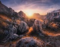 Rocks and stones at colorful sunset in autumn in Dolomites