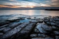 Rocky Lake Ontario shoreline at sunset Royalty Free Stock Photo