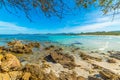 Rocks and turquoise water in Rena Bianca beach in Costa Smeralda Royalty Free Stock Photo