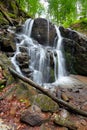 Rocks in waterfall stream. beautiful nature scenery in forest. cascade of rapid mountain river Royalty Free Stock Photo