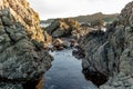 Rocks At Wellingtons Breaker Bay, Sunset Royalty Free Stock Photo