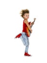 Rockstar kid dances with guitar