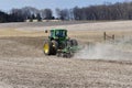 ROCKTON, ILLINOIS - APRIL 22,2020: A John Deere tracked tractor with corn planter getting ready to plant field Royalty Free Stock Photo