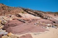 Rocky algarve coast with colorful sandstones, boardwalk to the Amado beach Royalty Free Stock Photo