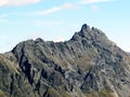 Rocky alpine peak UnghÃÂ¼rhÃÂ¶rner or Unghuerhoerner 2994 m of the Silvretta Alps mountain range in the Swiss Alps massif, Davos Royalty Free Stock Photo