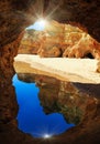 Rocky arch and sunshine on Algarve beach