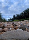 rocky background with cool white clouds. suitable for all media