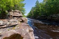 Rocky banks and forests along kettle river at banning Royalty Free Stock Photo