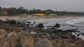 Rocky beach at arambol beach at sunset. State of Goa. India. Royalty Free Stock Photo