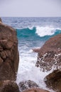 Rocky Beach and Beachcomber Royalty Free Stock Photo