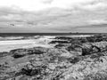 The rocky beach of Bedruthan Steps in Cornwall - an amazing landmark at the Cornish Coast Royalty Free Stock Photo