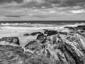 The rocky beach of Bedruthan Steps in Cornwall - an amazing landmark at the Cornish Coast Royalty Free Stock Photo