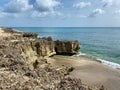 A rocky beach with clear turquoise water in Stuart, FL Royalty Free Stock Photo