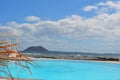 Rocky beach of Corralejo, Fuerteventura. View from the round pool.