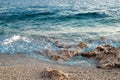 Rocky beach and crystal turquoise water of Ionian Sea in Albania. Calm and relaxing view