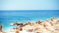 Rocky beach and crystal turquoise water of Ionian Sea in Albania. Calm and relaxing view