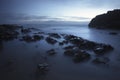 Rocky beach at dusk Royalty Free Stock Photo