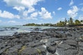 Rocky beach at Grand Gaube, North of Mauritius. Royalty Free Stock Photo