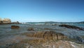 Rocky Beach in Greece, small waves in Agean Sea