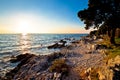 Rocky beach at low sun in Croatia Royalty Free Stock Photo