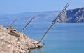 Rocky beach in Lukovo bay with fishing platforms, Croatia Royalty Free Stock Photo