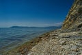 A rocky beach next to a body of water