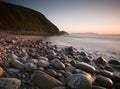 Rocky beach at sunset.