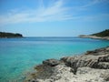 Rocky beach with turquoise waters, Hvar, Croatia