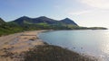 Rocky Beach on Wales Llyn Peninsula & Yr Eifl Mountain - Aerial Drone Descending