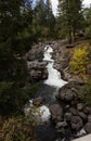 Rocky cascades below a home