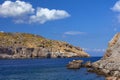 Rocky cliff at the edge of the Mediterranean Sea Royalty Free Stock Photo