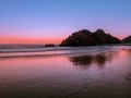 Sunset sky reflections on the beach at Pacific Coast Royalty Free Stock Photo