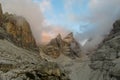 Rocky cliffs tower of Dolomites mountains in the clouds, Dolomiti di Brenta Royalty Free Stock Photo
