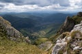 Rocky cliffs of Vlasic mountain and valley with villages