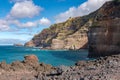 Rocky cliffs in the western part of Sao Miguel island, near Ponta da Ferraria. Azores, Portugal
