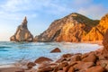 Small Beach Surrounded by Cliffs at Sunset Royalty Free Stock Photo