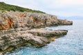 Rocky coast with azure blue water.