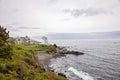 Rocky coast and beach house in York Maine Royalty Free Stock Photo