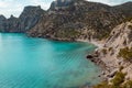 Rocky coast with beautiful sea and azure waves.