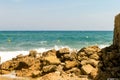 Rocky coast of the Cote d`azur sea of France Antibes near the port Royalty Free Stock Photo