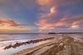 Rocky coast on the island of CuraÃÂ§ao at sunset