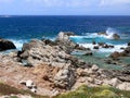 Rocky coast on mediterranean sea with wild waves Royalty Free Stock Photo