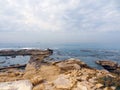 Rocky coast near the ancient Caesarea national park on the Mediterranean coastline, Israel. Royalty Free Stock Photo